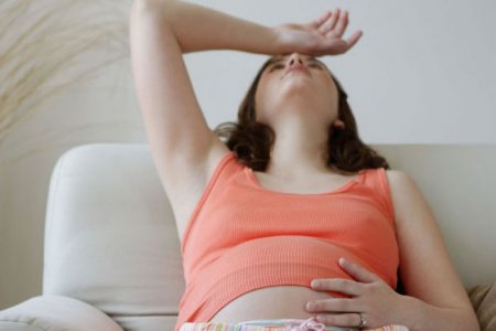 Головная боль при беременности: что делать, причины возникновения 
